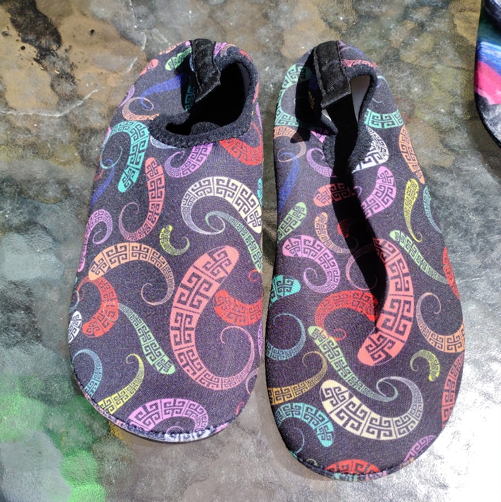 Women's water slippers with multicolored swirl design, size 38/39.